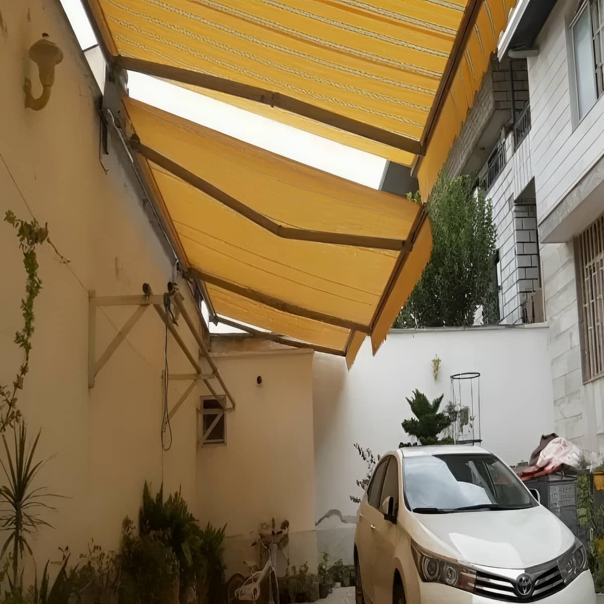 سایبان برقی بازویی
