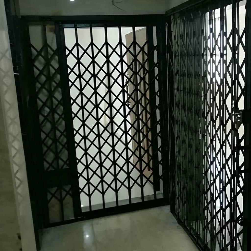 نصب درب آکاردئونی چهارگل در سیرجان