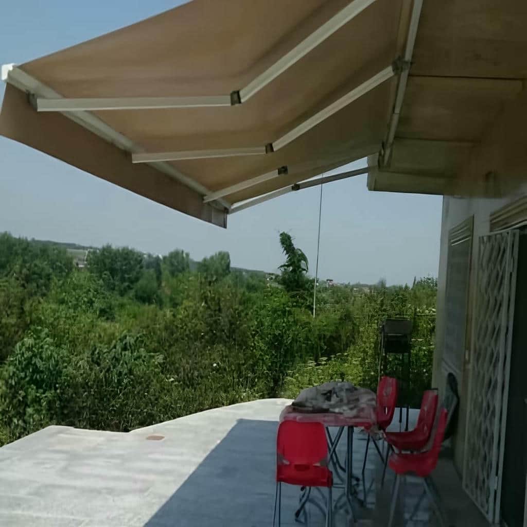 سایبان برقی سنسوردار با حفاظت از پارچه