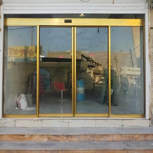 درب اتوماتیک شیشه ای لولایی با فریم آلومینیومی مقاوم
