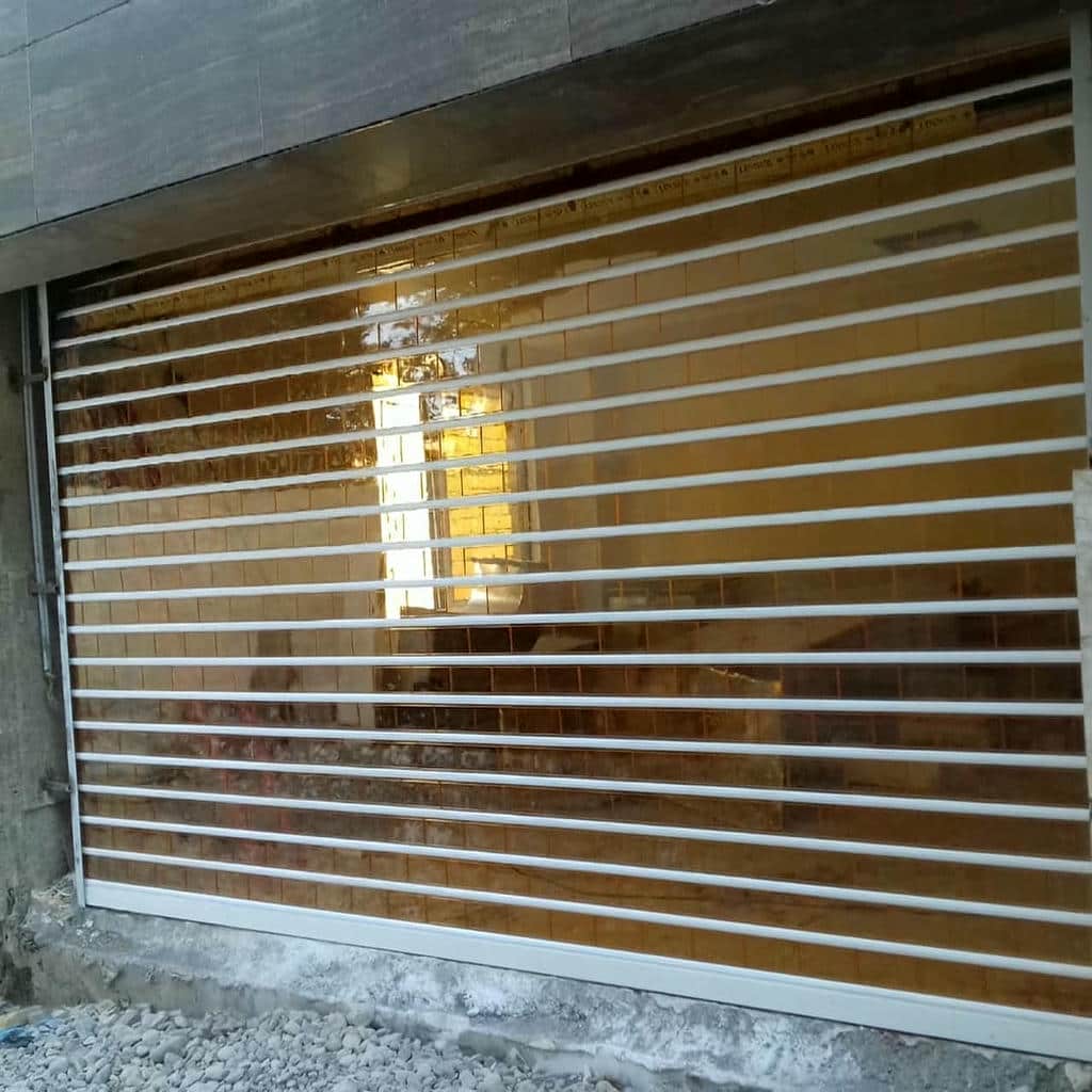 کرکره برقی پارکینگ خودرو ساختمان با موتور مناسب تردد