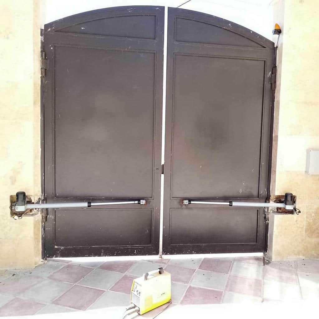 خدمات جک درب پارکینگ ایرانی بازویی برای درب لولایی
