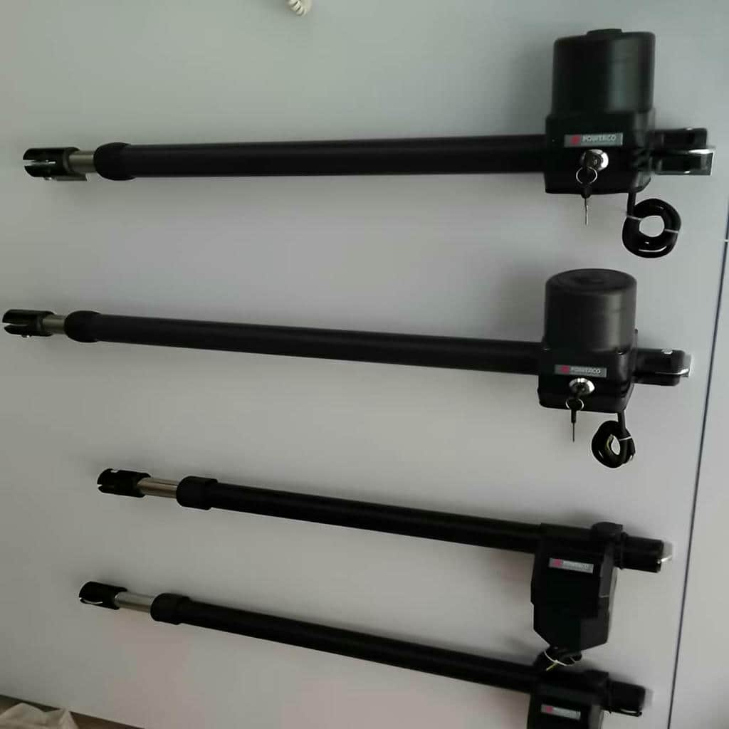 اجرای جک بازویی درب پارکینگ دو لنگه برای درب لولایی