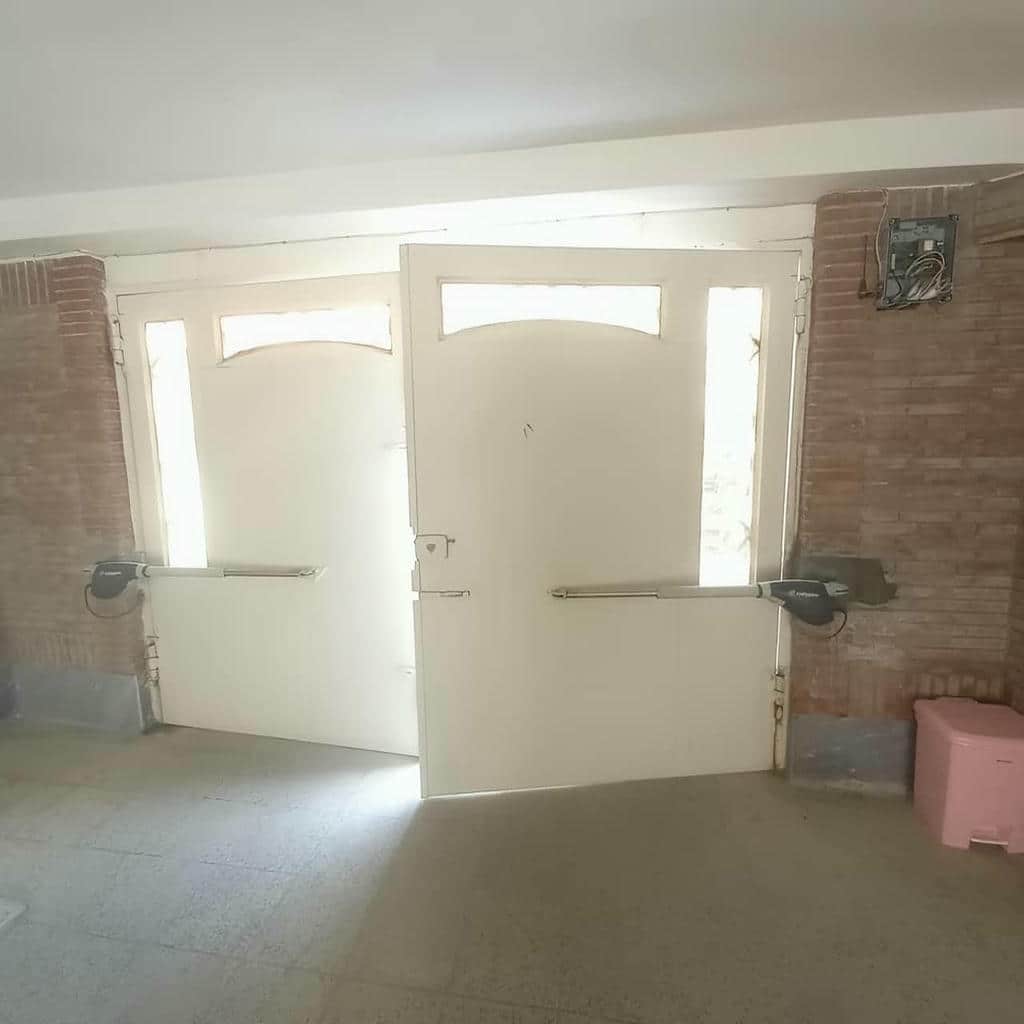 قیمت جک بازویی درب پارکینگ دو لنگه متناسب با مدل سفارش